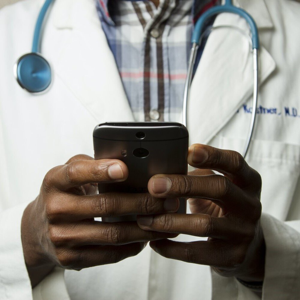 Doctor with Phone2 Doctor with Phone2